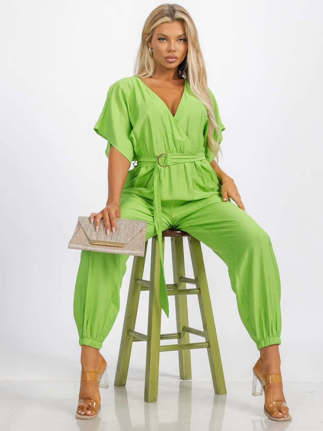 WOMEN'S SHORT SLEEVE SURPLICE FRINT POCKET SKINNY LEGS BELTED JUMPSUIT